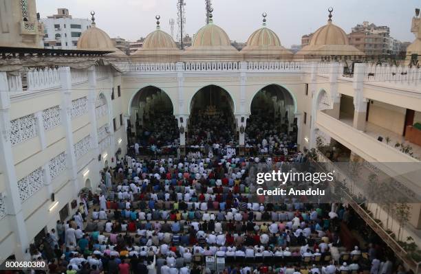 Muslims perform Eid al-Fitr prayer at Abu Bakr al-Siddiq Mosque in Cairo, Egypt on June 25, 2017. Eid al-Fitr is a religious holiday celebrated by...