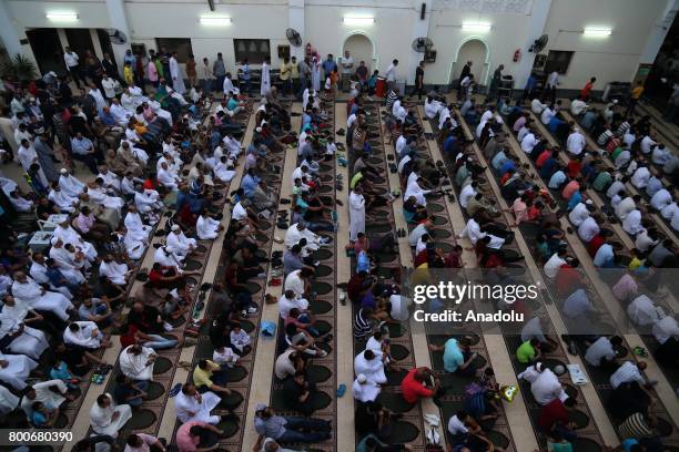 Muslims gather to perform Eid al-Fitr prayer at Abu Bakr al-Siddiq Mosque in Cairo, Egypt on June 25, 2017. Eid al-Fitr is a religious holiday...