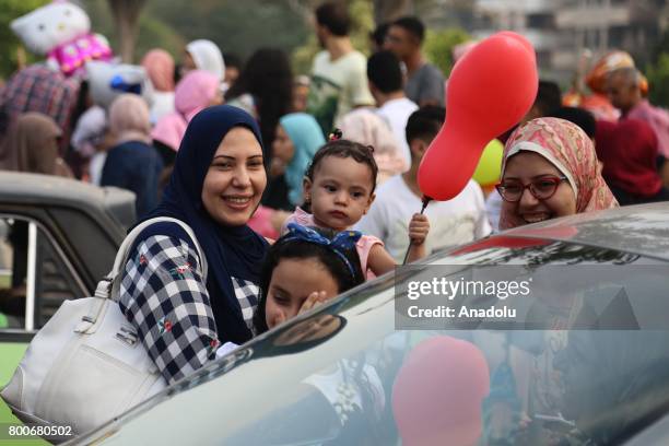 Baloons are presented for people after the Eid al-Fitr prayer at Abu Bakr al-Siddiq Mosque in Cairo, Egypt on June 25, 2017. Eid al-Fitr is a...