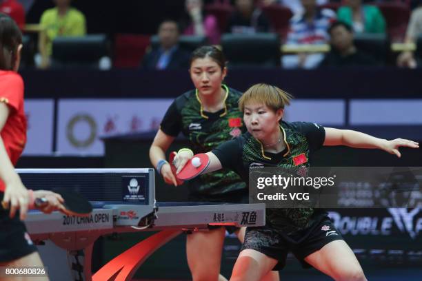 Chen Meng and Zhu Yuling of China compete against Ding Ning and Liu Shiwen of China during the Women's doubles final match of 2017 ITTF World Tour...