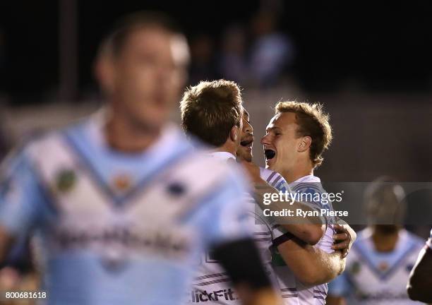 Dale Cherry-Evans of the Sea Eagles celebrates after Matthew Wright of the Sea Eagles scored a try during the round 16 NRL match between the Cronulla...