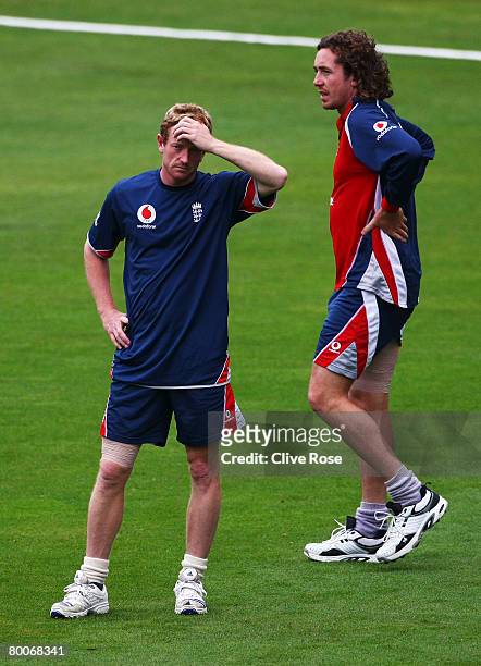 Paul Collingwood and Ryan Sidebottom of England participate in a pre match training session during day three of the warm up match between a New...