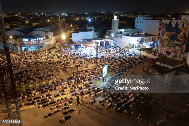 Moroccan worshipers perform the last 'Tarawih' prayer during the Islamic holy month of Ramadan in Rabat city center. The moon-sighting committee in...