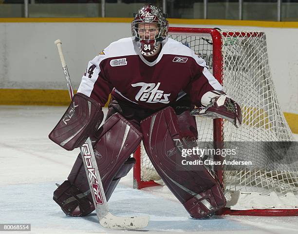 Trevor Cann of the Peterborough Petes keeps an eye on the play in a game against the Oshawa Generals on February 28, 2008 at the Peterborough...