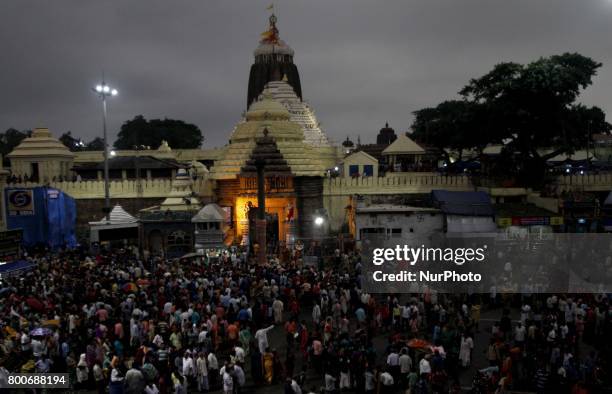 Devotees gathered in front of the Shree Jagannath temple as they arrives to participate ditties annual rath yatra festival or chariot festival as...