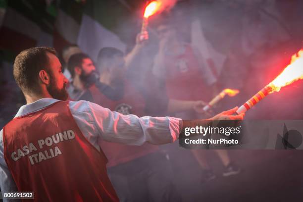 Thousands of members of Italian far-right movement CasaPound from all over Italy march with flags and shout slogans during a demonstration to protest...