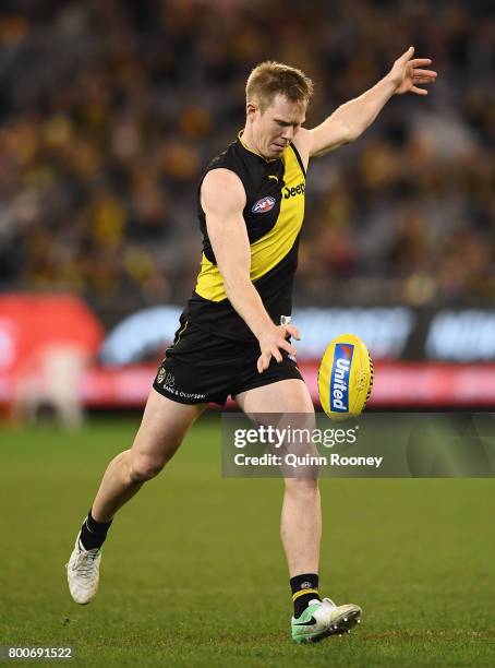 Jack Riewoldt of the Tigers kicks during the round 14 AFL match between the Richmond Tigers and the Carlton Blues at Melbourne Cricket Ground on June...