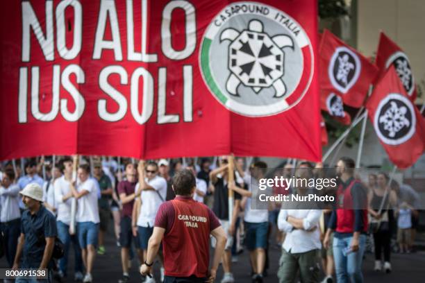 Thousands of members of Italian far-right movement CasaPound from all over Italy march with flags and shout slogans during a demonstration to protest...