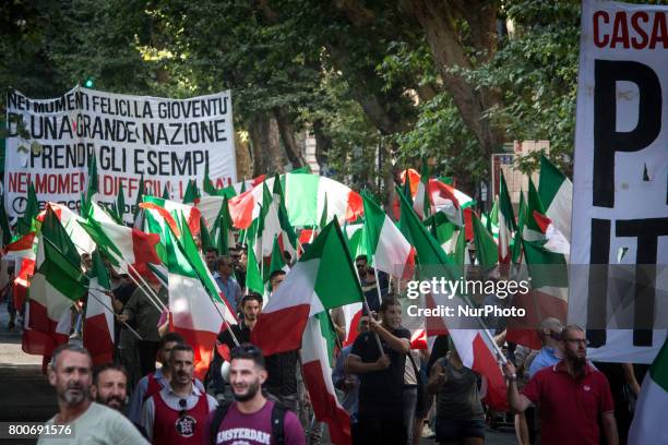 Thousands of members of Italian far-right movement CasaPound from all over Italy march with flags and shout slogans during a demonstration to protest...