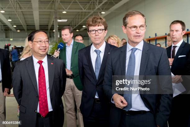 Berlin's Mayor Michael Mueller , Chinese Ambassador to Germany Shi Mingde and CEO of Berlin Brandenburg Airport Engelbert Luetke Daldrup are pictured...