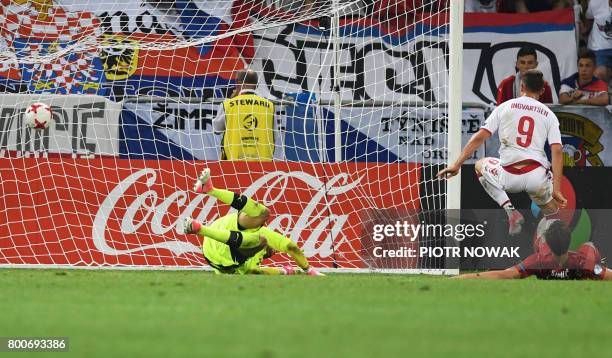 Denmark's forward Marcus Ingvartsen scores the fourth goal past Czech Republic's goalkeeper Lukas Zima during the UEFA U-21 European Championship...