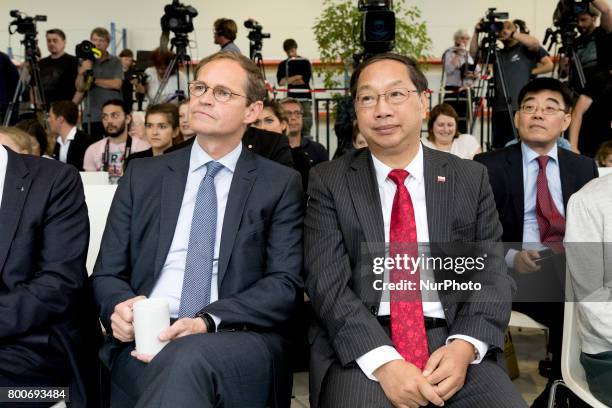 Berlin's Mayor Michael Mueller and Chinese Ambassador to Germany Shi Mingde are pictured before the arrival of panda couple Meng Meng and Jiao Qing...