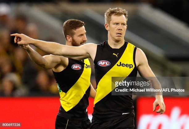 Kane Lambert and Jack Riewoldt of the Tigers celebrate during the 2017 AFL round 14 match between the Richmond Tigers and the Carlton Blues at the...