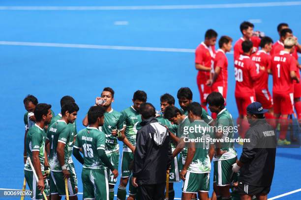 The Pakistan team take on water during a break during the 7th/8th place match between Pakistan and China on day nine of the Hero Hockey World League...