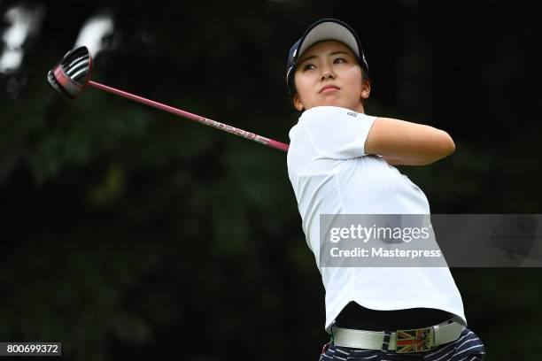 Kotone Hori of Japan hits her tee shot on the 12th hole during the final round of the Earth Mondamin Cup at the Camellia Hills Country Club on June...