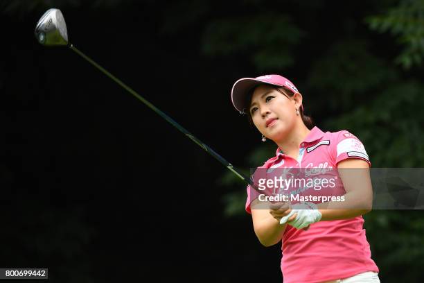 Kotono Kozuma of Japan hits her tee shot on the 14th hole during the final round of the Earth Mondamin Cup at the Camellia Hills Country Club on June...
