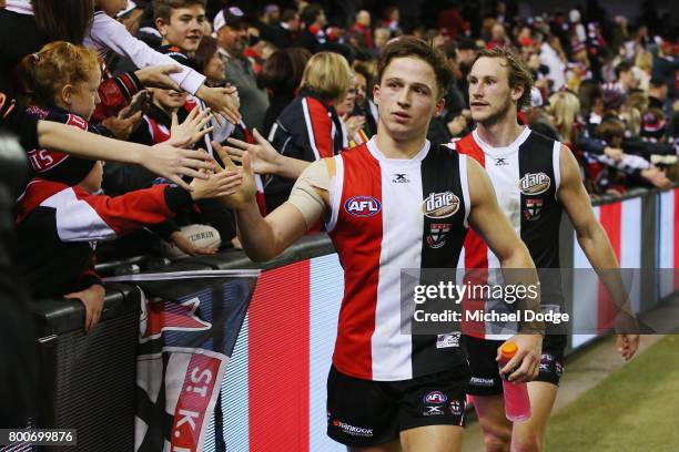 Jack Billings of the Saints celebrates the win with fans during the round 14 AFL match between the St Kilda Saints and the Gold Coast Suns at Etihad...