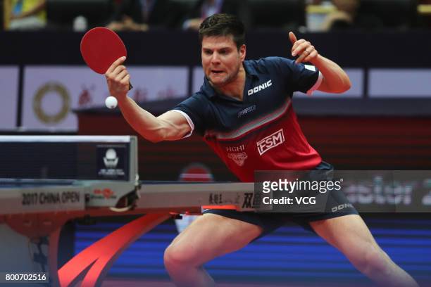 Dimitrij Ovtcharov of Germany competes against Timo Boll of Germany during the Men's singles final match of 2017 ITTF World Tour China Open at...