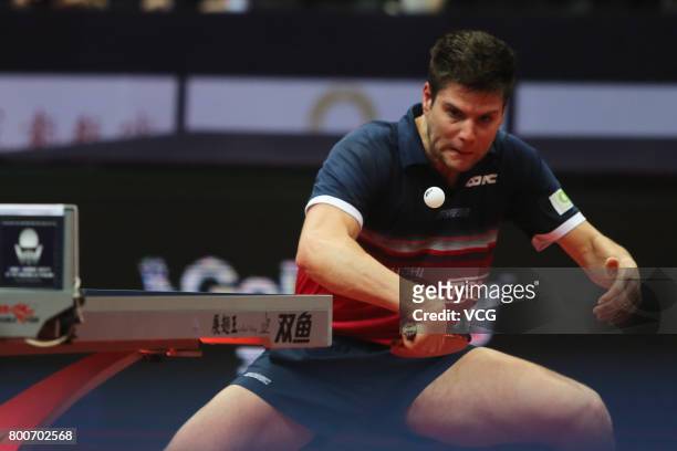 Dimitrij Ovtcharov of Germany competes against Timo Boll of Germany during the Men's singles final match of 2017 ITTF World Tour China Open at...