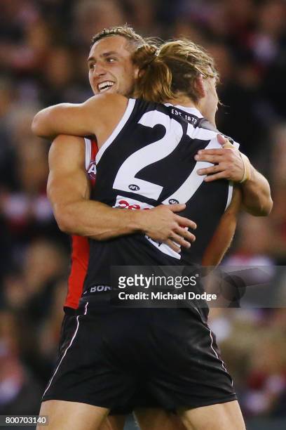 Luke Dunstan and Josh Bruce of the Saints celebrates a goal during the round 14 AFL match between the St Kilda Saints and the Gold Coast Suns at...