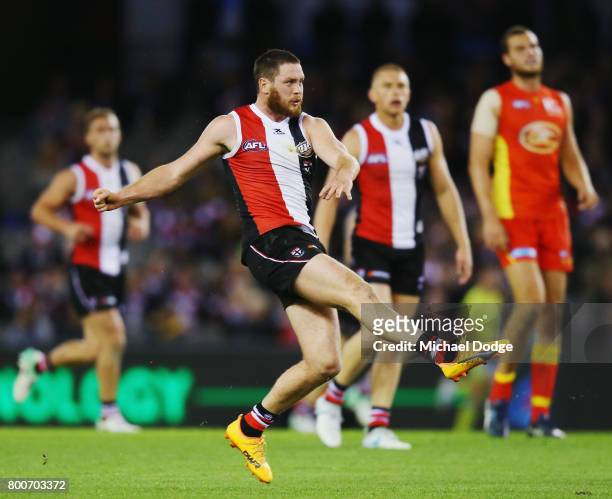 Jack Steven of the Saints kicks the ball during the round 14 AFL match between the St Kilda Saints and the Gold Coast Suns at Etihad Stadium on June...