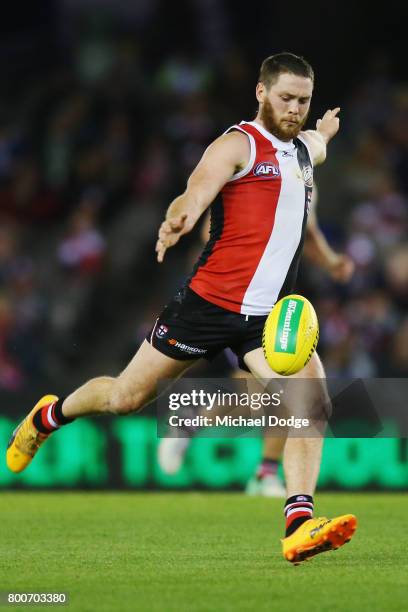 Jack Steven of the Saints kicks the ball during the round 14 AFL match between the St Kilda Saints and the Gold Coast Suns at Etihad Stadium on June...