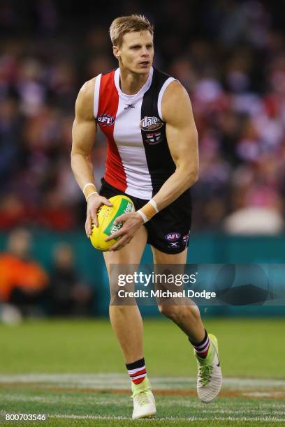 Nick Riewoldt of the Saints looks upfield during the round 14 AFL match between the St Kilda Saints and the Gold Coast Suns at Etihad Stadium on June...