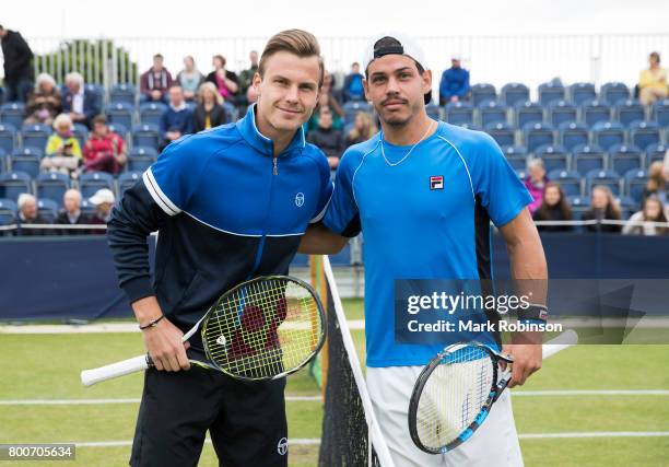 Marton Fucsovics of Hungary and Alex Bolt of Australia coin toss before their men's singles final on June 25, 2017 in Ilkley, England.