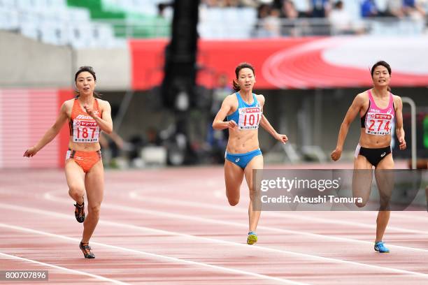 Kana Ichikawa, Chisato Fukushima and Mizuki Nakamura of Japan compete in the Women 200m final during the 101st Japan National Championships at Yanmar...