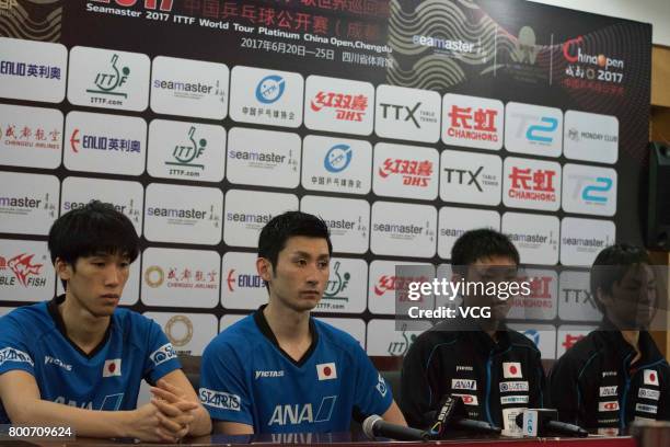 Maharu Yoshimura and Jin Ueda, Tomokazu Harimoto and Koki Niwa of Japan attend a press conference after Men's doubles final match of 2017 ITTF World...