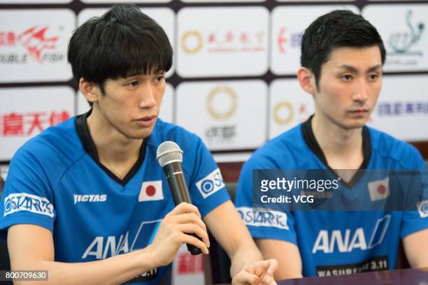 Maharu Yoshimura and Jin Ueda of Japan attend a press conference after beating Tomokazu Harimoto and Koki Niwa of Japan in Men's doubles final match...
