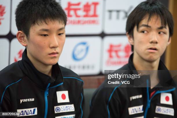 Tomokazu Harimoto and Koki Niwa of Japan attend a press conference after Men's doubles final match against Maharu Yoshimura and Jin Ueda of Japan...