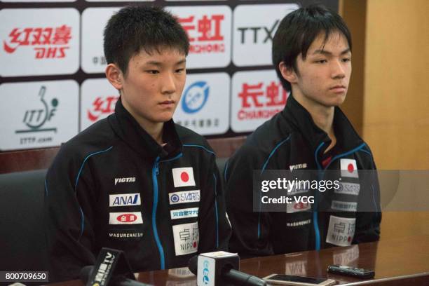 Tomokazu Harimoto and Koki Niwa of Japan attend a press conference after Men's doubles final match against Maharu Yoshimura and Jin Ueda of Japan...