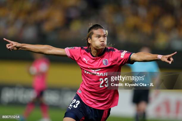 Tatsuya Yamashita of Cerezo Osaka celebrates scoring his side's third goal during the J.League J1 match between Vegalta Sendai and Cerezo Osaka at...