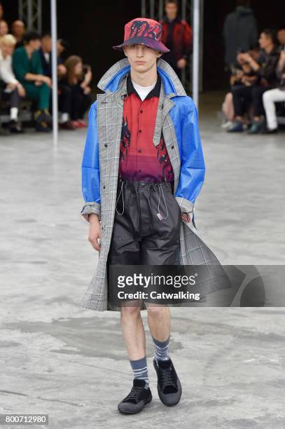 Model walks the runway at the Lanvin Spring Summer 2018 fashion show during Paris Menswear Fashion Week on June 25, 2017 in Paris, France.