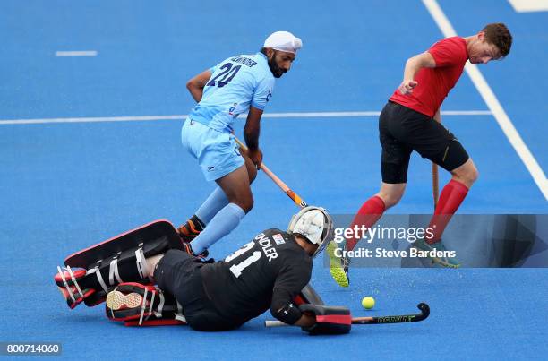 Antoni Kindler of Canada saves a shot from Talwinder Singh of India during the 5th/6th place match between India and Canada on day nine of the Hero...
