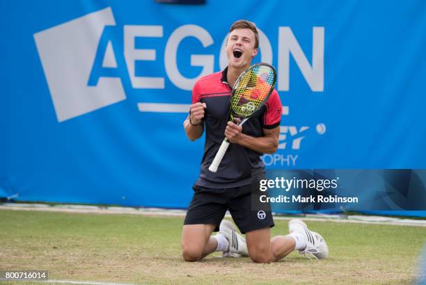 Marton Fucsovics of Hungary celebrates winning the men's singles final on June 25, 2017 in Ilkley, England.