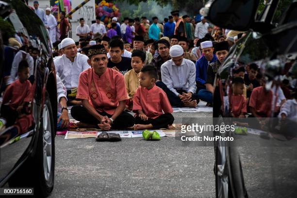 Indonesian Muslims attend Eid Al-Fitr prayer at An-Nur Grand Mosque on June 25, 2017 in Pekanbaru, Indonesia Eid Al-Fitr marks the end of Ramadan,...