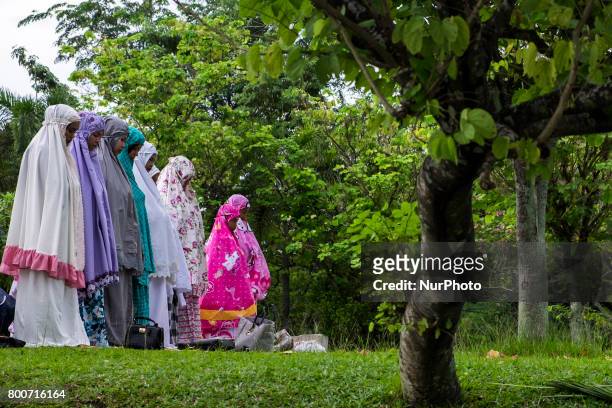 Indonesian Muslims attend Eid Al-Fitr prayer at An-Nur Grand Mosque on June 25, 2017 in Pekanbaru, Indonesia Eid Al-Fitr marks the end of Ramadan,...