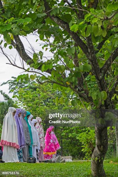 Indonesian Muslims attend Eid Al-Fitr prayer at An-Nur Grand Mosque on June 25, 2017 in Pekanbaru, Indonesia Eid Al-Fitr marks the end of Ramadan,...