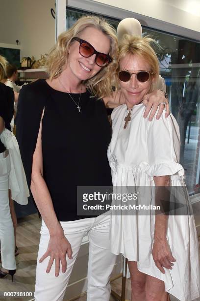 Debbie Loeffler and Lisa Jackson attend Lisa Jackson & David Chines hosts LJ Cross, Rose & Shopping Party at Copious Row at Copious Row on June 24,...