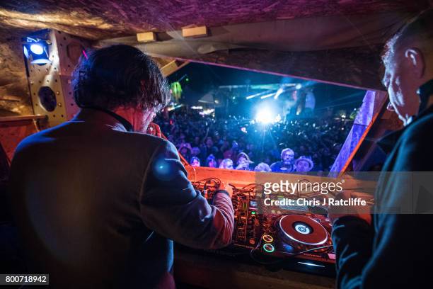 Musician Jarvis Cocker plays a DJ set from a wooden tree structure in the Greenpeace are at Glastonbury Festival Site on June 25, 2017 in...