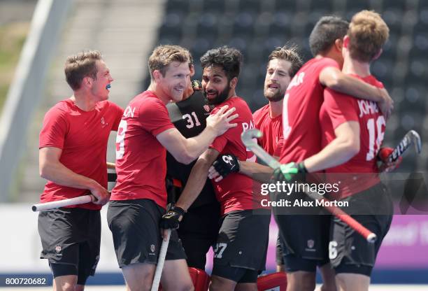 Canada players celebrate World Cup qualification after the 5th/6th place match between India and Canada on day nine of the Hero Hockey World League...