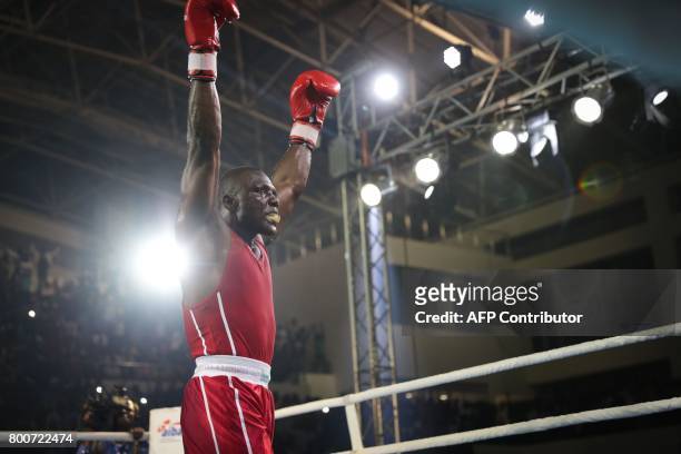 Congo's Laury Yannick Pembouabeka celebrates on the ring, during the African Championships of the International Boxing Association , in Brazzaville...