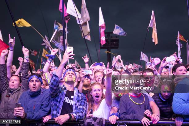 Crowds watch the Foo Fighters performance at the Glastonbury Festival site at Worthy Farm in Pilton on June 24, 2017 near Glastonbury, England....