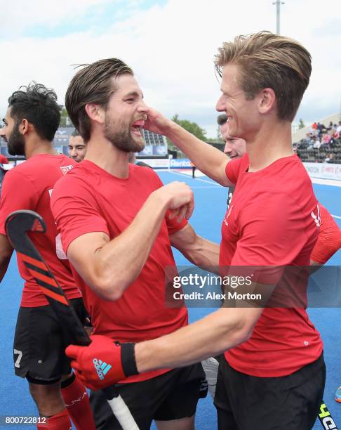 Iain Smythe of Canada and Foris Van Son of Canada embrace after the 5th/6th place match between India and Canada on day nine of the Hero Hockey World...