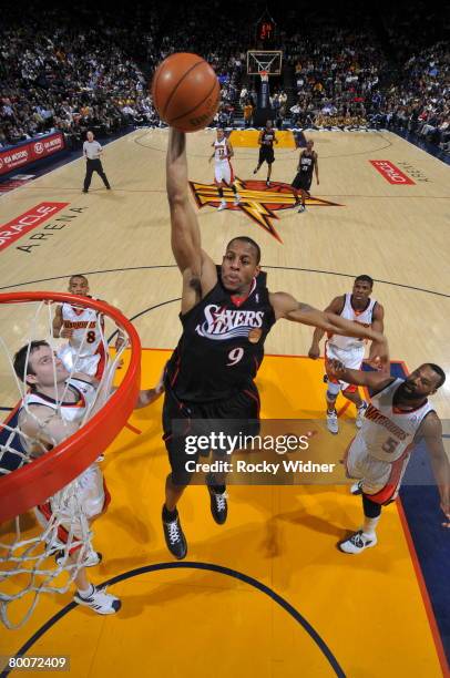 Andre Iguodala of the Philadelphia 76ers goes up for a dunk againt the Golden State Warriors on February 29, 2008 at ORACLE Arena in Oakland,...