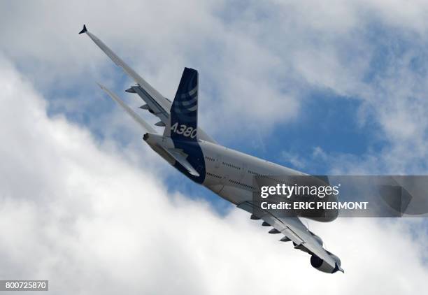 An Airbus A380 performs a flight display on the last day of the International Paris Air Show on June 25, 2017 at Le Bourget Airport, near Paris.