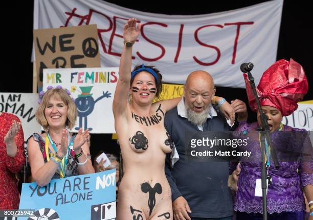 Festival founder Michael Eavis is joined by Rachel Rousham from the White Ribbon Alliance and members of the Avalonian Choir for a pro-feminist event...
