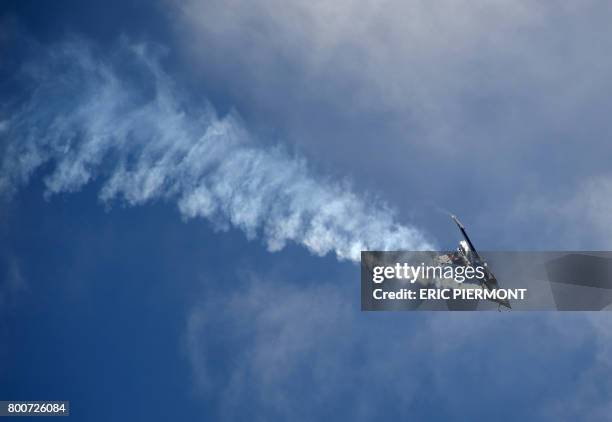 Dassault Aviation Rafale jet performs a flight display on the last day of the International Paris Air Show on June 25, 2017 at Le Bourget Airport,...